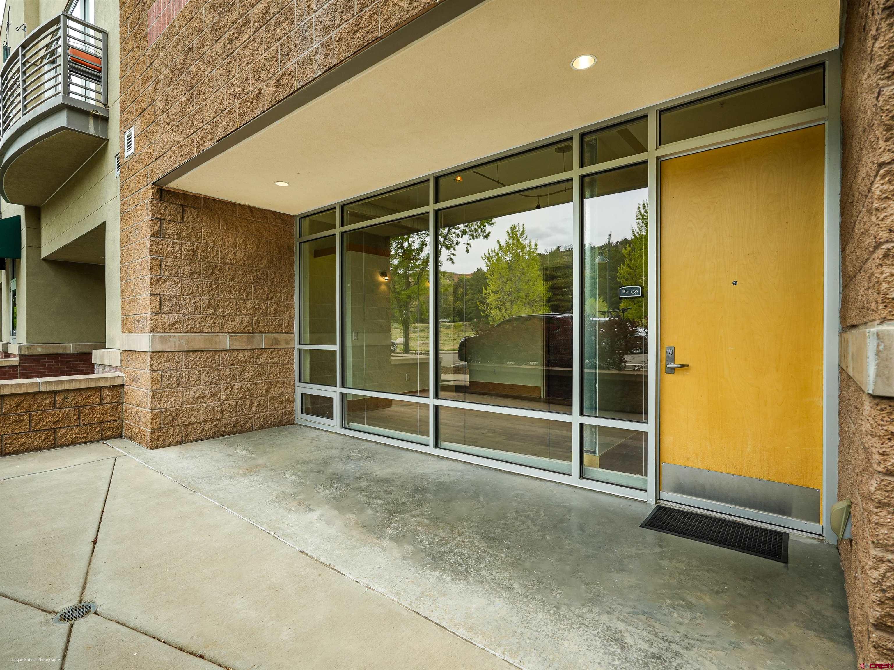 555 Rivergate Lane, Unit B2139 Durango, CO 81301 - Photo 5 of 32 a view of an empty room with glass door