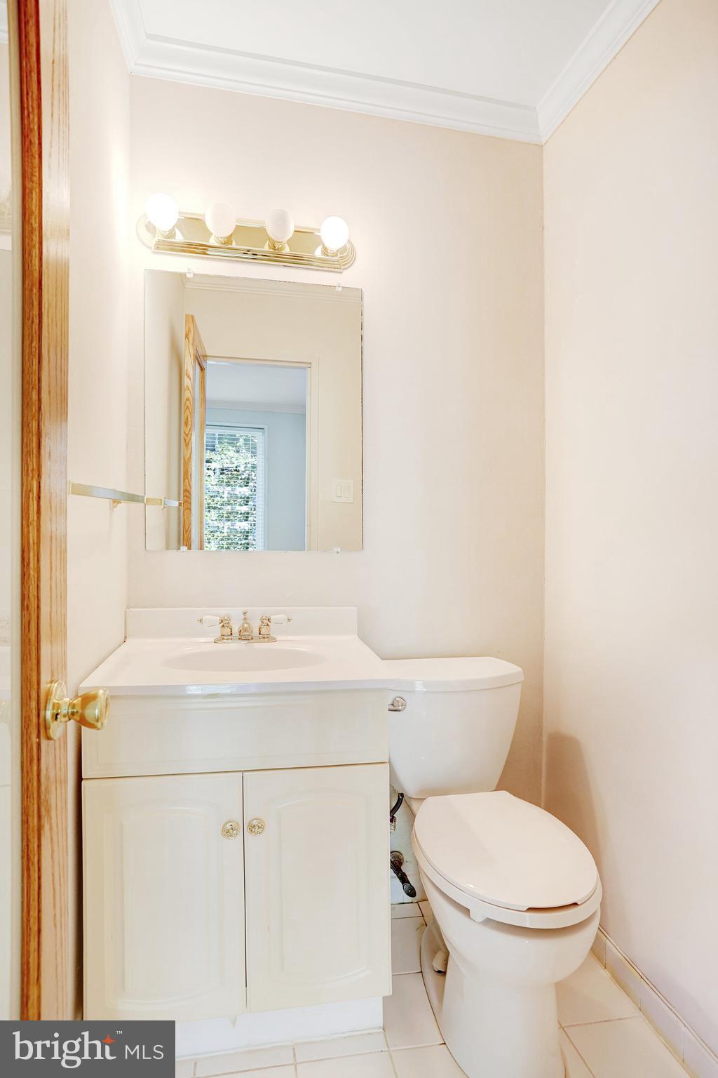 42 G Street Southwest Washington, DC 20024 - Photo 19 of 54 a bathroom with a toilet sink and mirror