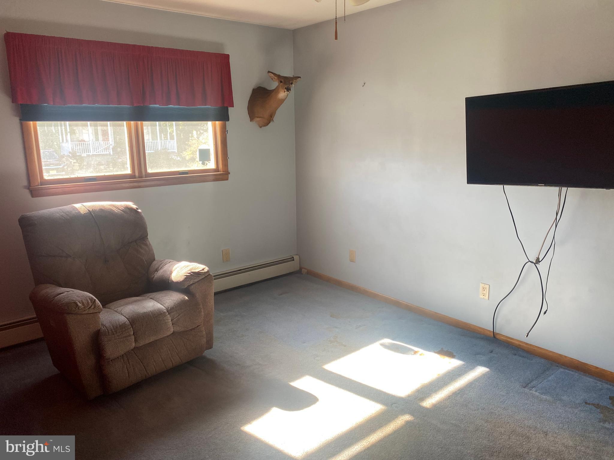 18 Alden Avenue Delran, NJ 08075 - Photo 19 of 32 a living room with furniture and a flat screen tv