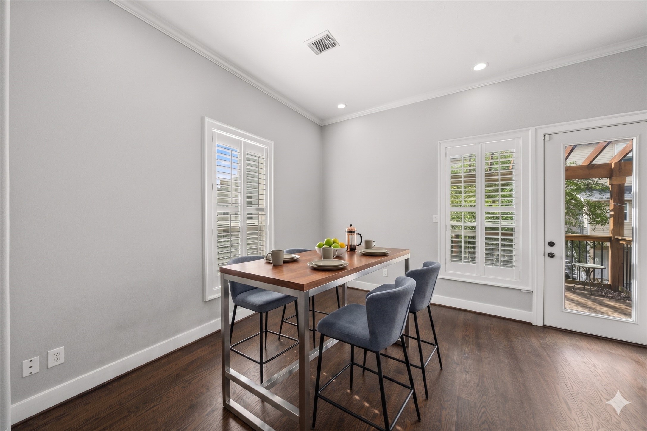1317 Bomar Street Houston, TX 77006 - Photo 13 of 32 a dining room with furniture and wooden floor