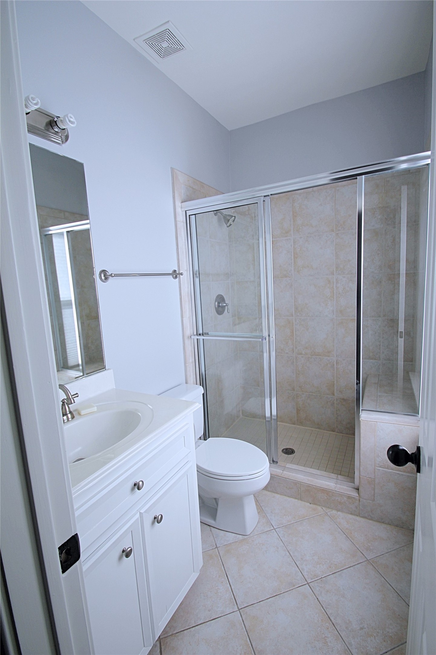 1317 Bomar Street Houston, TX 77006 - Photo 15 of 27 a bathroom with a granite countertop sink toilet and shower