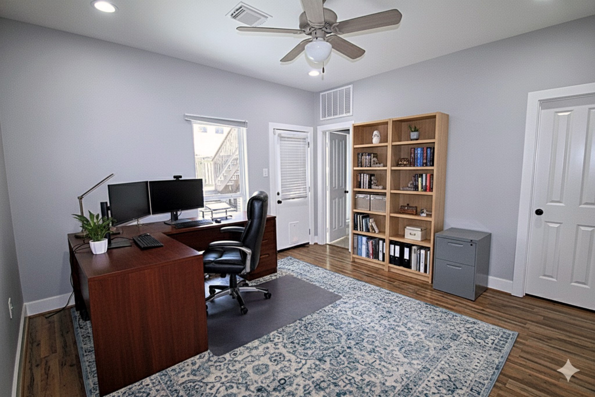 1317 Bomar Street Houston, TX 77006 - Photo 16 of 27 a view of a workspace with furniture and a window