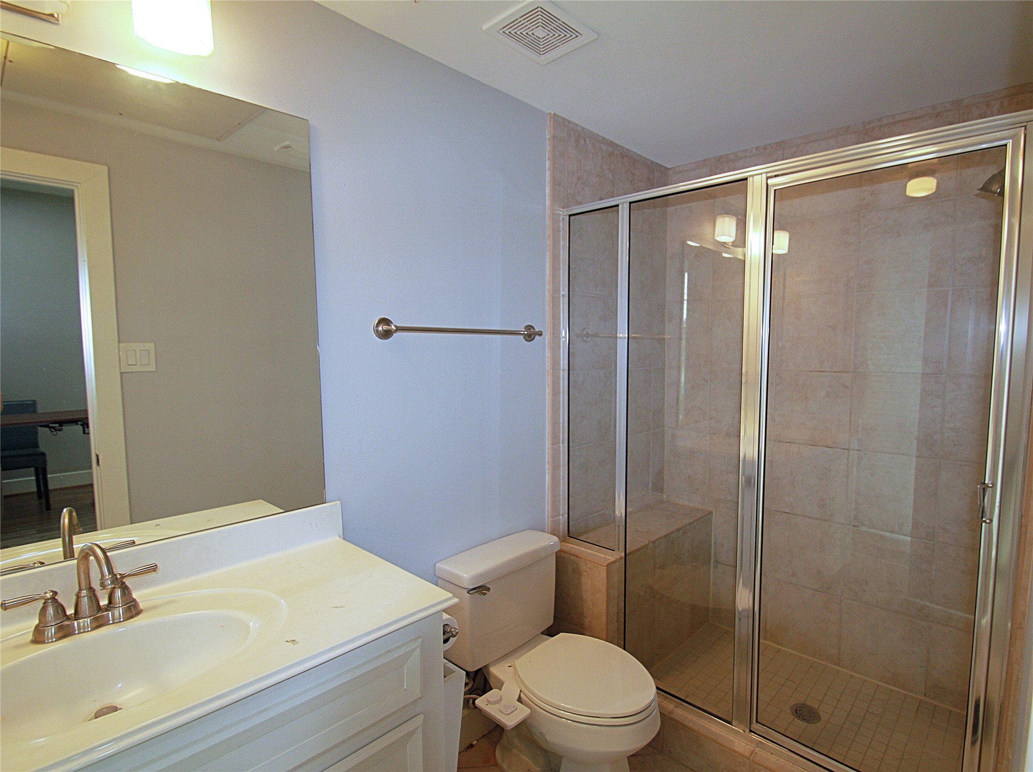 1317 Bomar Street Houston, TX 77006 - Photo 17 of 27 a bathroom with a sink toilet and shower