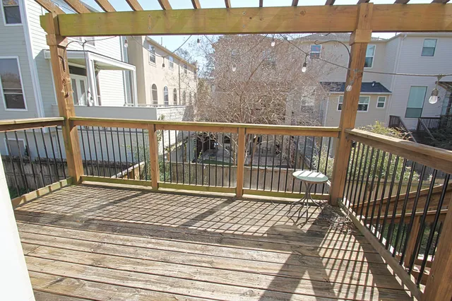 a view of a backyard with sitting area