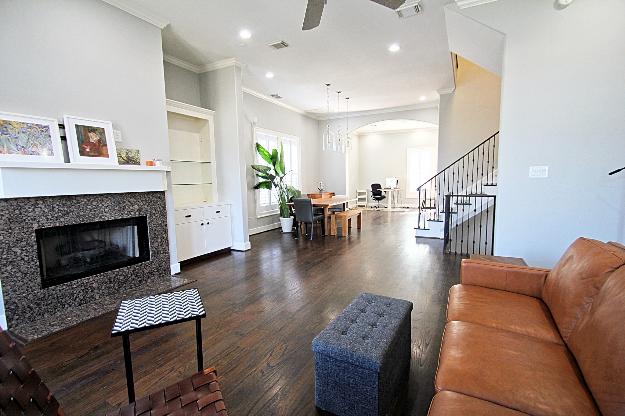 1317 Bomar Street Houston, TX 77006 - Photo 27 of 27 a living room with furniture a table and a fireplace