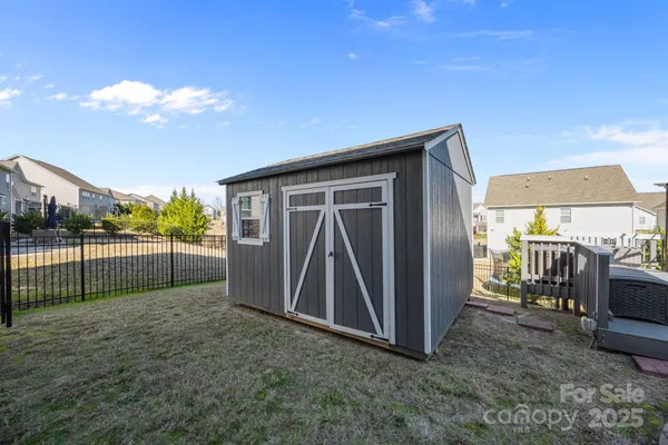 a view of outdoor space and backyard