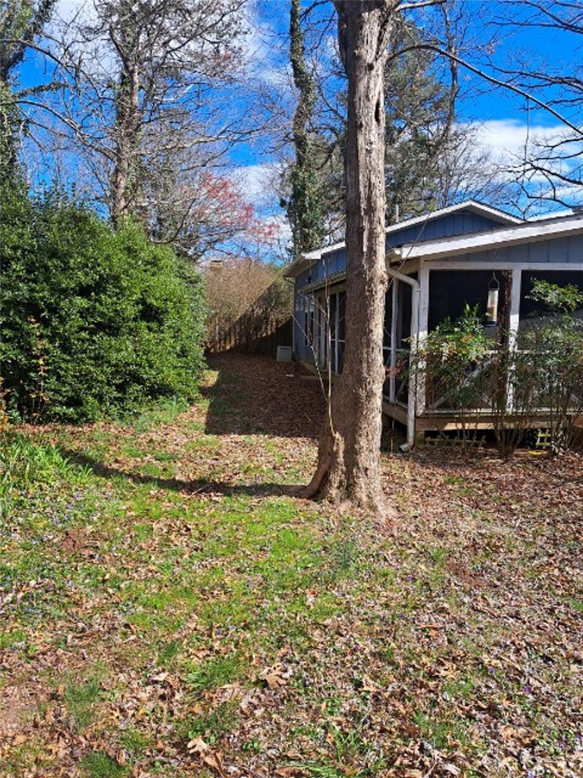 51 Roper Road East Flat Rock, NC 28726 - Photo 1 of 10 front view of a house with a yard