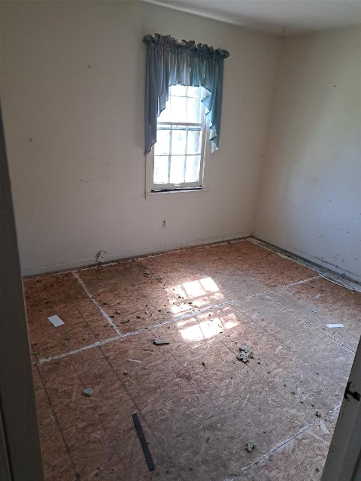 51 Roper Road East Flat Rock, NC 28726 - Photo 7 of 10 a view of empty room with window
