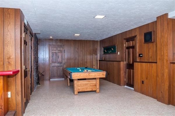 2 Lakeshore Drive Wakefield, MA 01880 - Photo 18 of 29 a room with furniture and wooden door