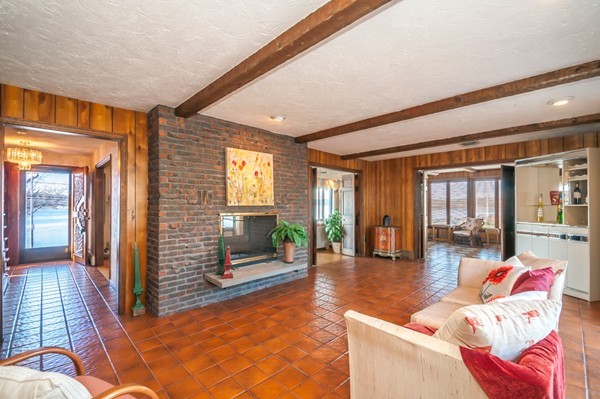 2 Lakeshore Drive Wakefield, MA 01880 - Photo 22 of 29 a living room with furniture and a fireplace