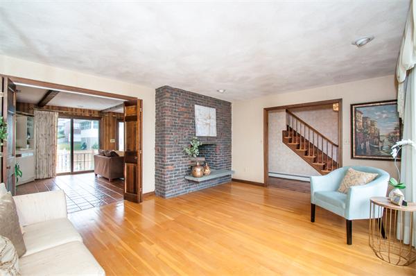 2 Lakeshore Drive Wakefield, MA 01880 - Photo 3 of 29 a view of an empty room with furniture wooden floor and windows
