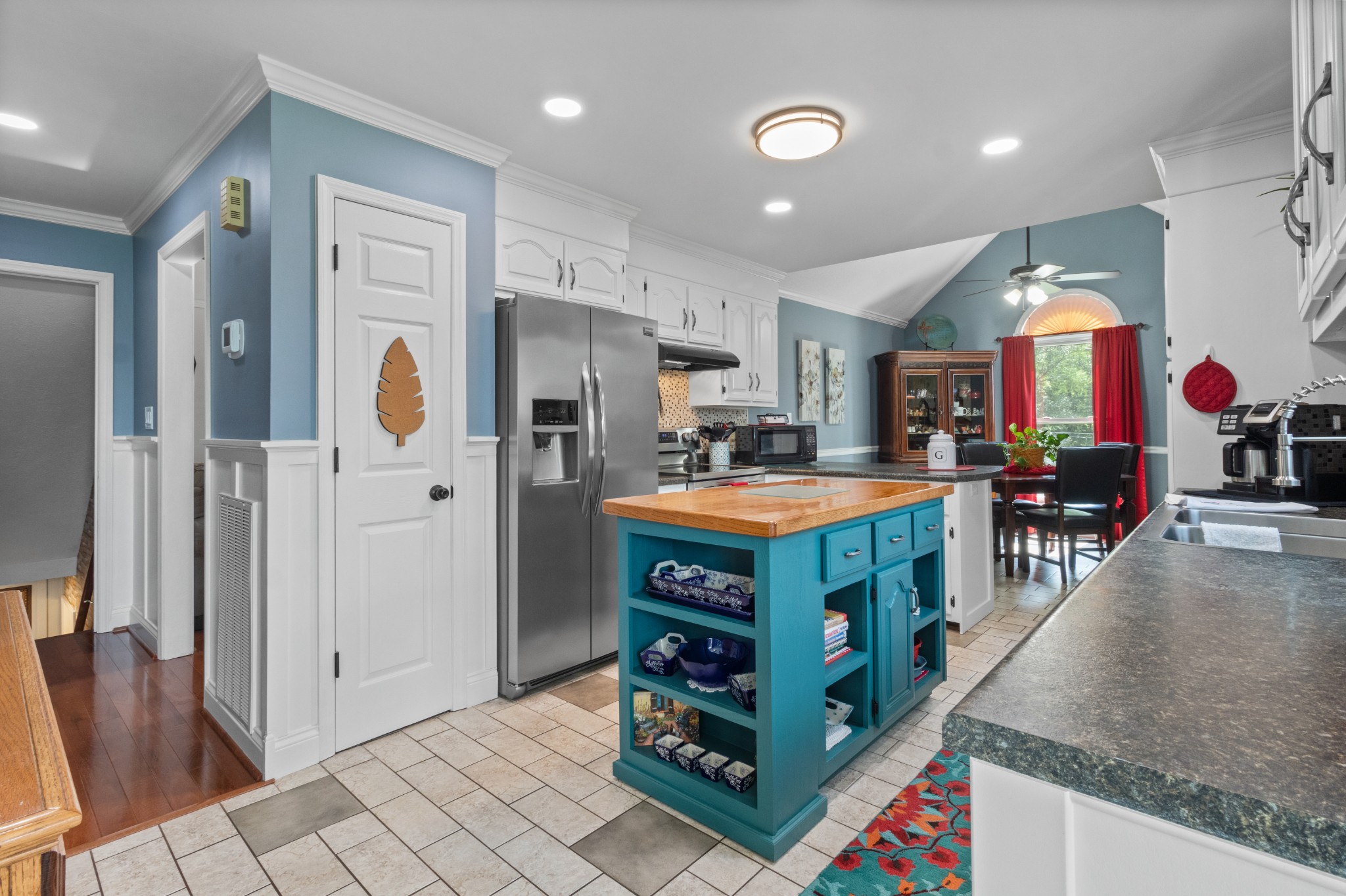 901 Riverchase Road Adams, TN 37010 - Photo 12 of 35 a kitchen with stainless steel appliances granite countertop a refrigerator and a stove