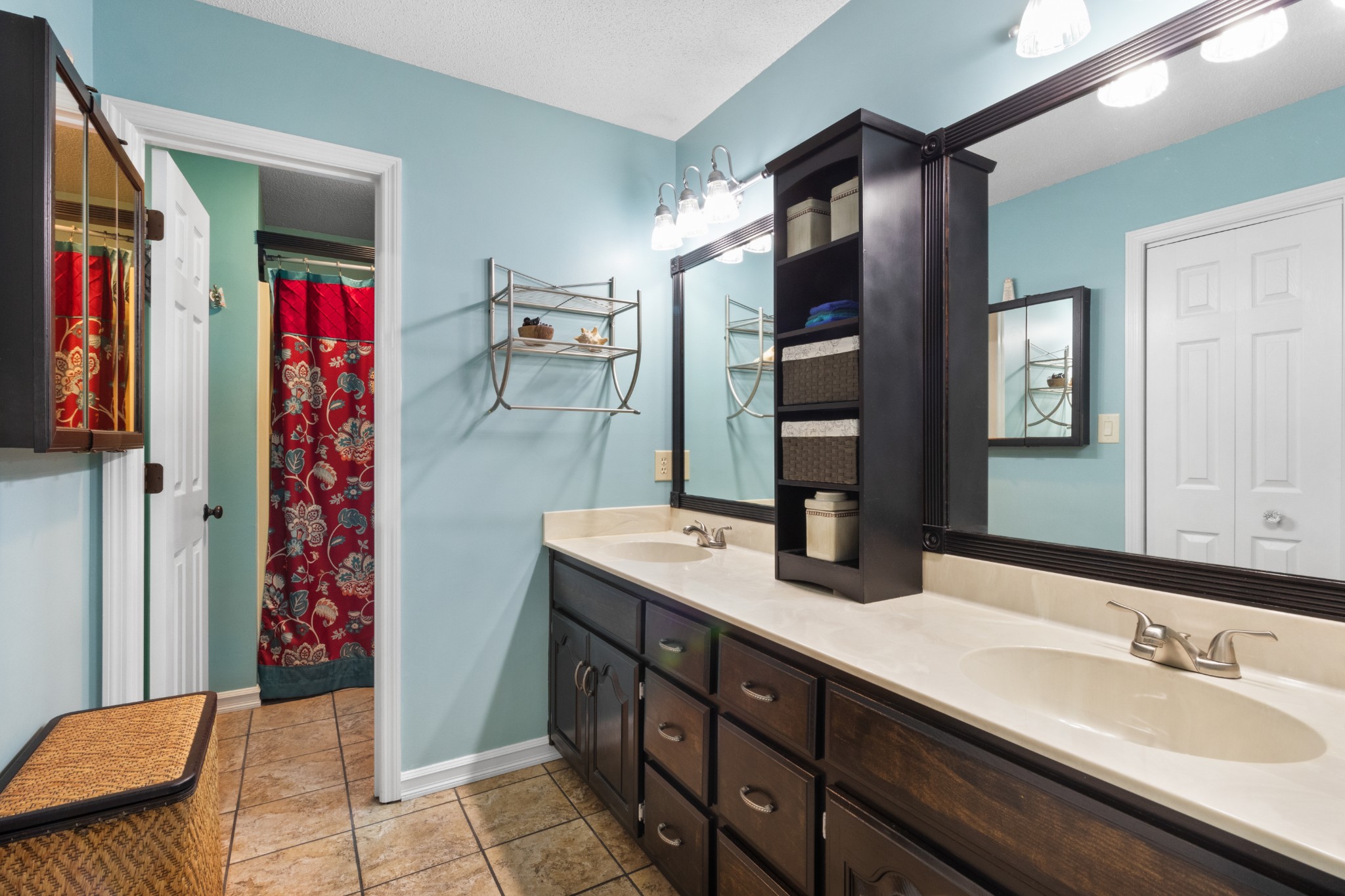 901 Riverchase Road Adams, TN 37010 - Photo 15 of 35 a bathroom with a double vanity sink and a mirror
