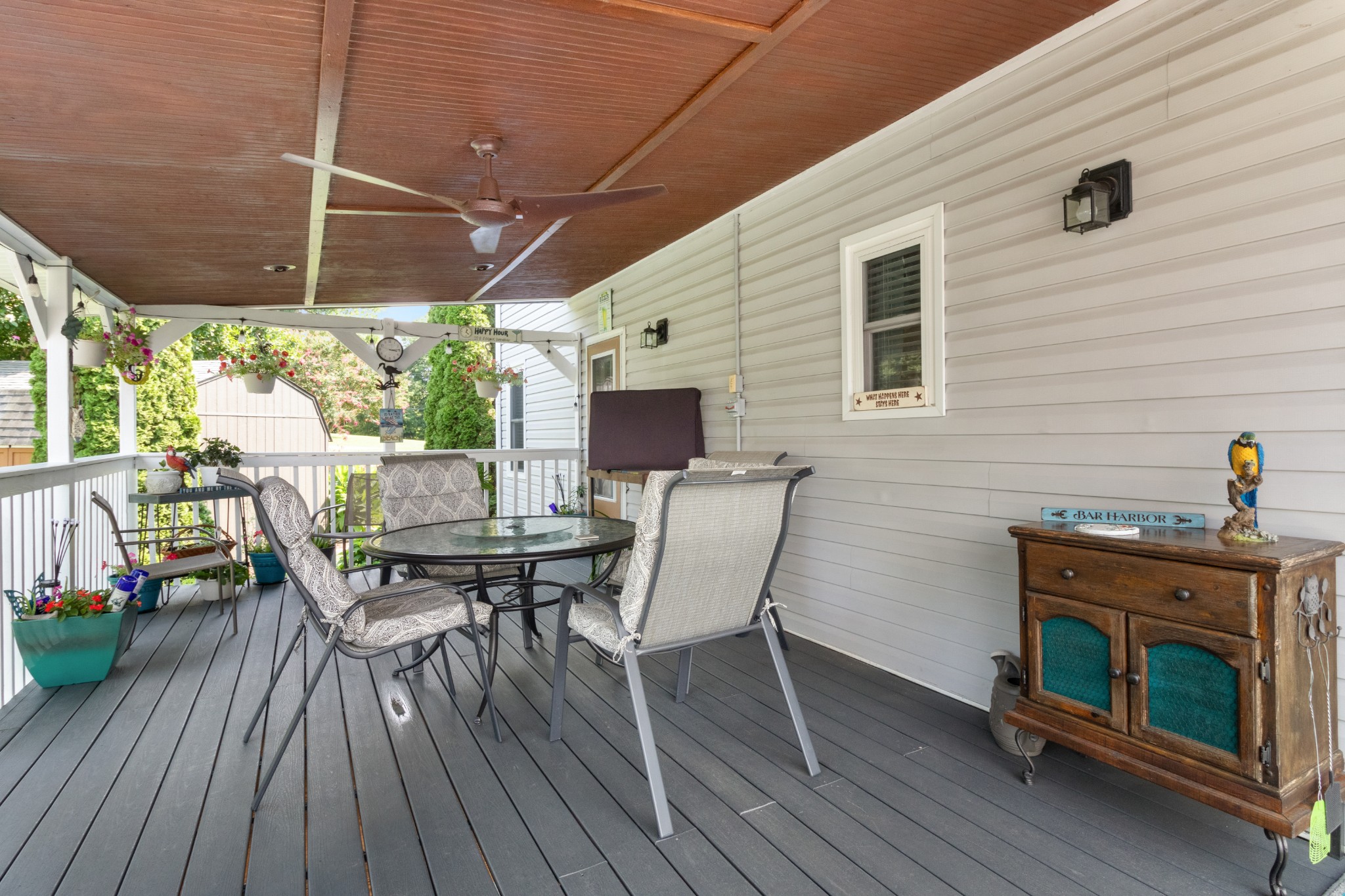901 Riverchase Road Adams, TN 37010 - Photo 16 of 35 a view of a patio with table and chairs and wooden floor