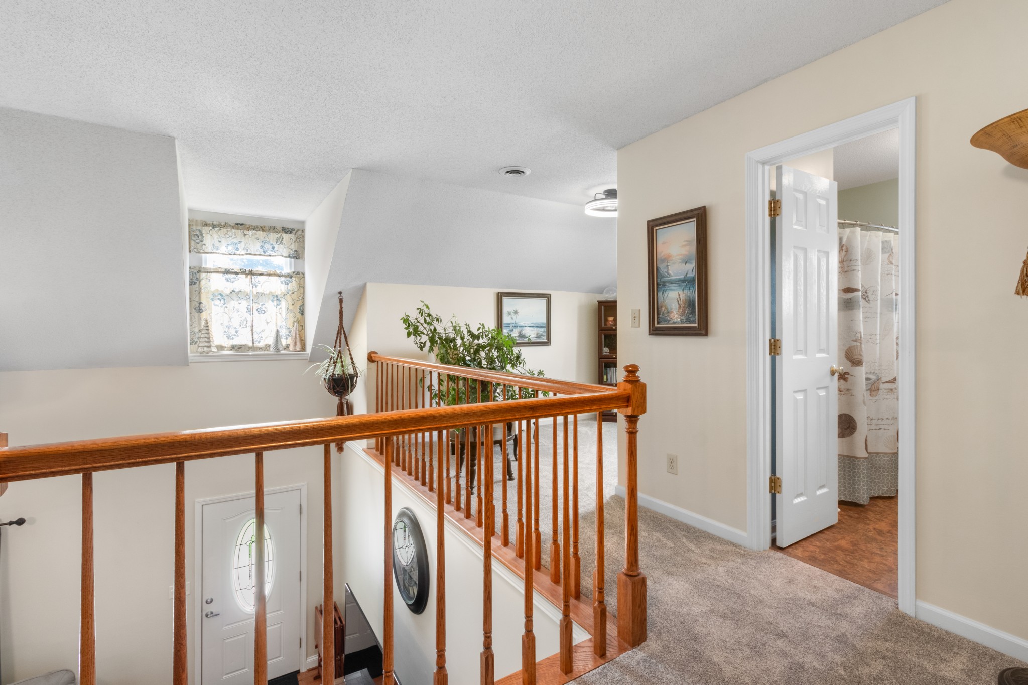 901 Riverchase Road Adams, TN 37010 - Photo 19 of 35 a view of a hallway with windows and stairs