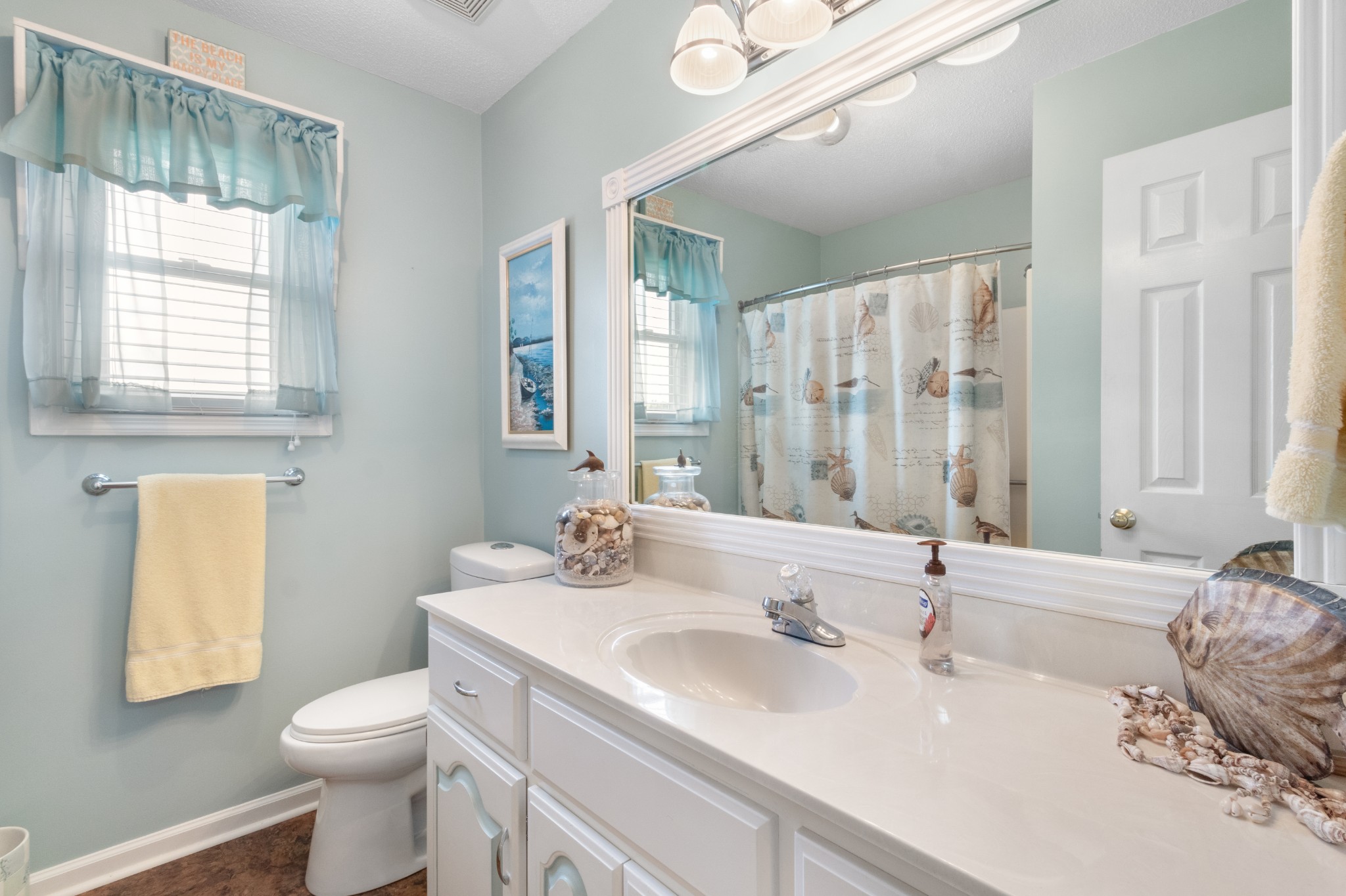 901 Riverchase Road Adams, TN 37010 - Photo 21 of 35 a bathroom with a sink and a toilet