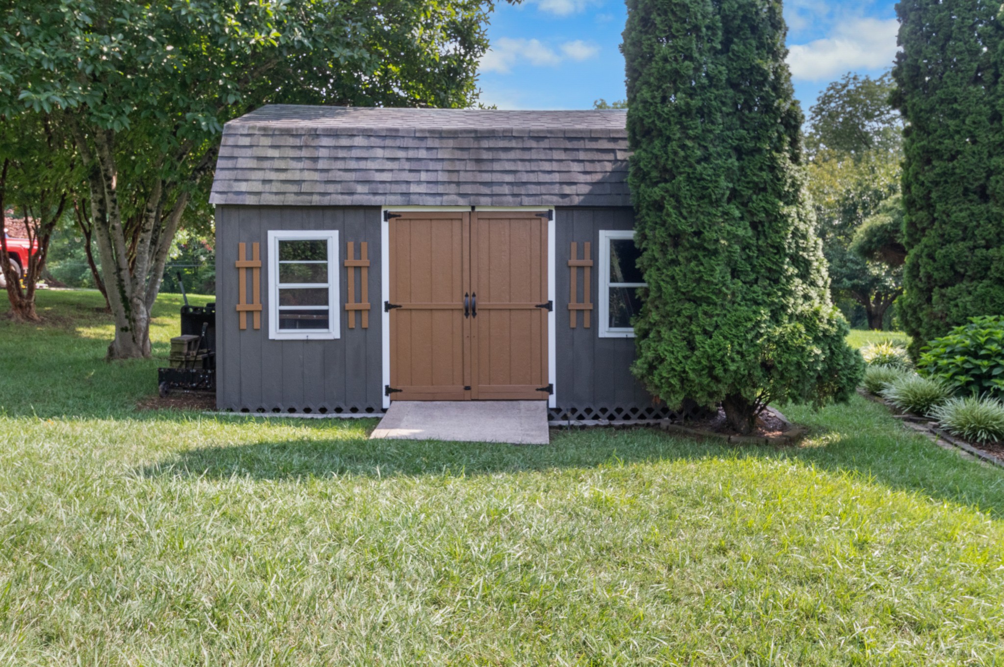 901 Riverchase Road Adams, TN 37010 - Photo 31 of 35 a view of a house with a yard and tree