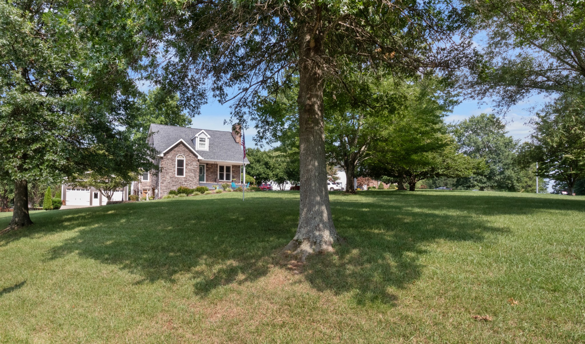901 Riverchase Road Adams, TN 37010 - Photo 35 of 35 a front view of a house with a garden