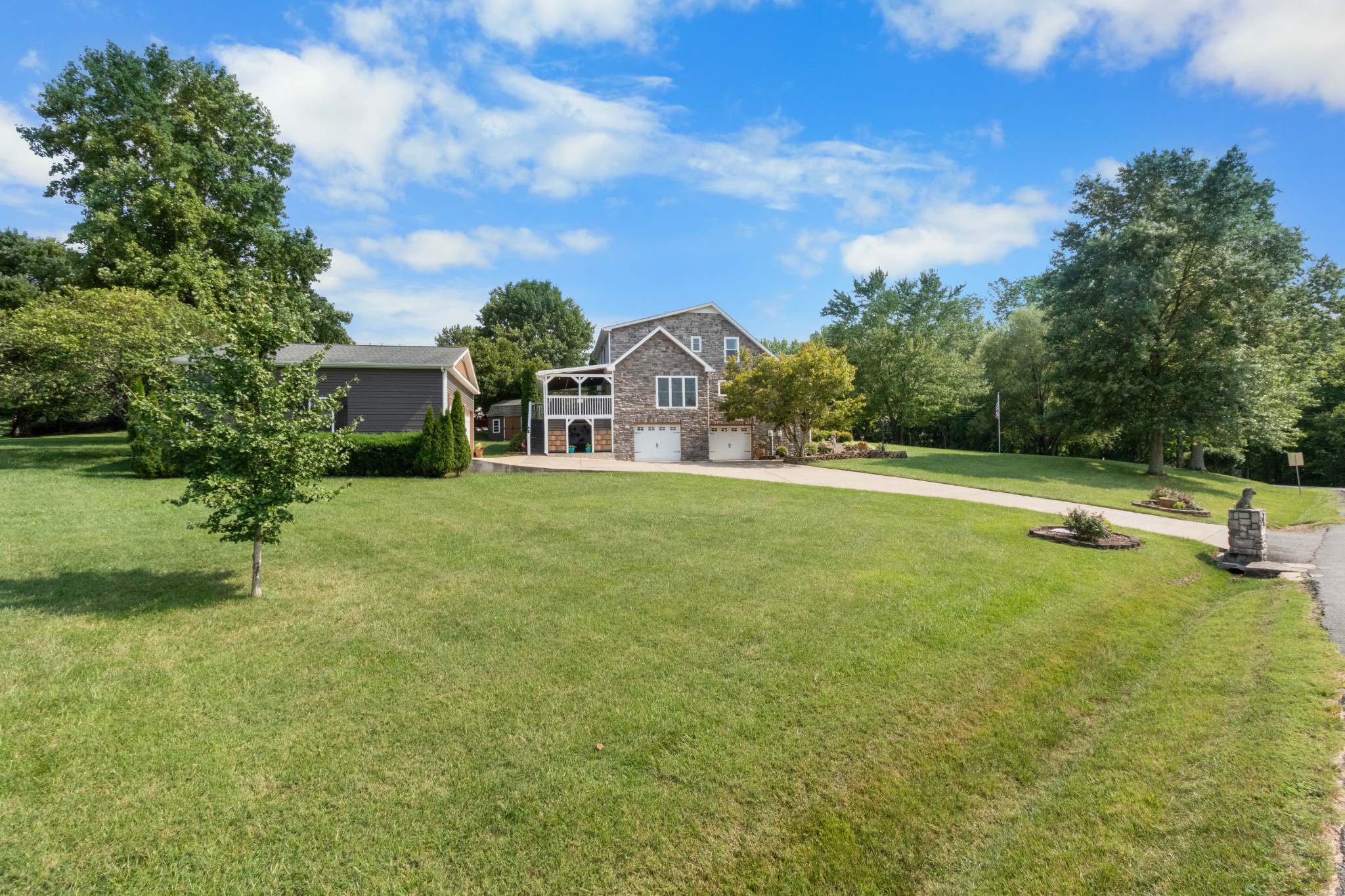 901 Riverchase Road Adams, TN 37010 - Photo 4 of 35 a view of a house with a yard