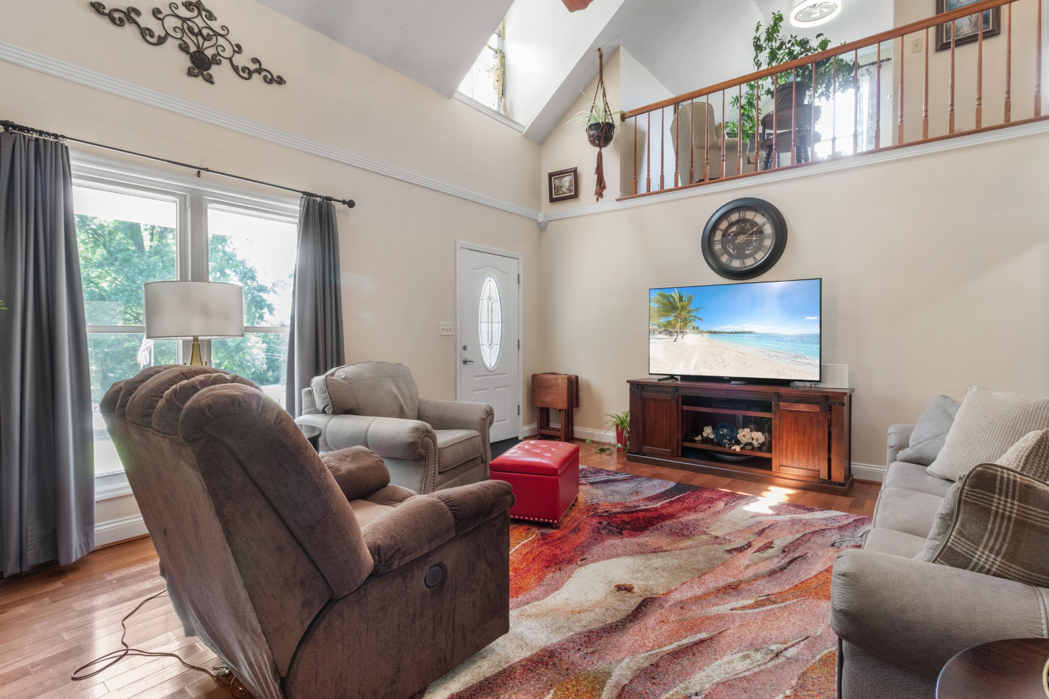 901 Riverchase Road Adams, TN 37010 - Photo 8 of 35 a living room with furniture a rug and a fireplace