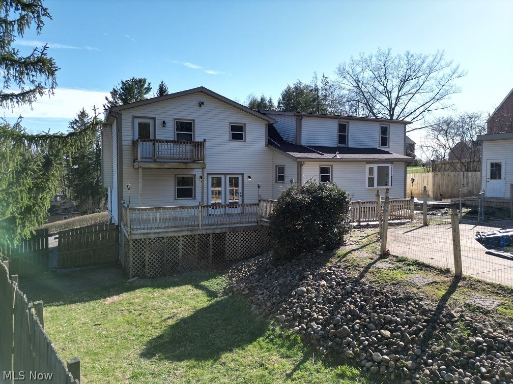 144 Aberdeen Road Steubenville, OH 43953 - Photo 32 of 34 Back of property with a fenced backyard, a deck, and a balcony