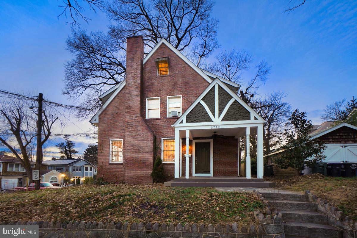 6712 6th Street Northwest Washington, DC 20012 - Photo 1 of 41 a front view of a house with a yard
