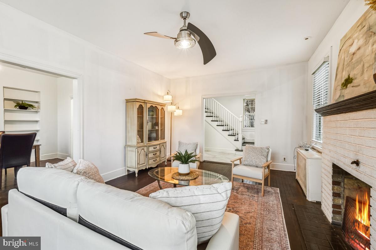 6712 6th Street Northwest Washington, DC 20012 - Photo 11 of 41 a living room with fireplace furniture and a flat screen tv