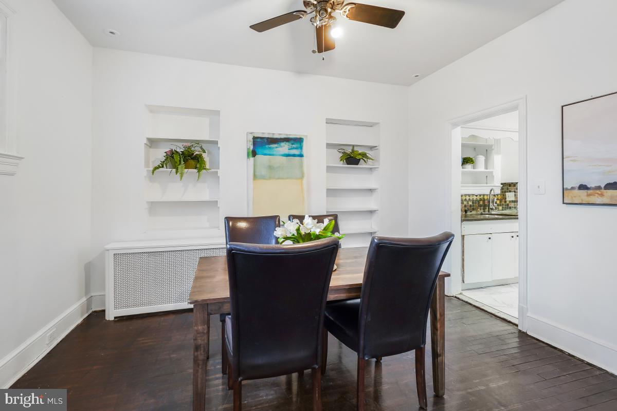 6712 6th Street Northwest Washington, DC 20012 - Photo 12 of 41 a view of a dining room with furniture and wooden floor