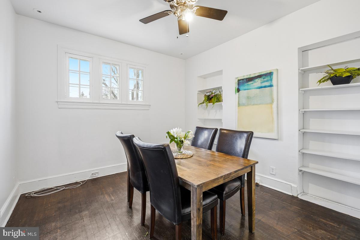 6712 6th Street Northwest Washington, DC 20012 - Photo 13 of 41 a view of a dining room with furniture and wooden floor