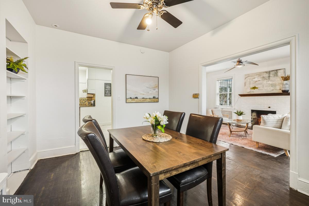 6712 6th Street Northwest Washington, DC 20012 - Photo 14 of 41 a view of a dining room with furniture and wooden floor