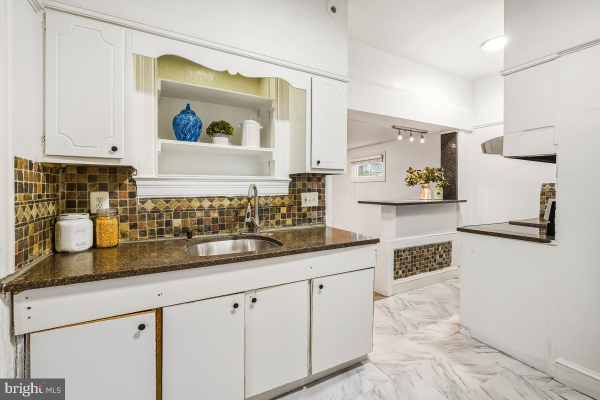6712 6th Street Northwest Washington, DC 20012 - Photo 16 of 41 a kitchen with sink and cabinets