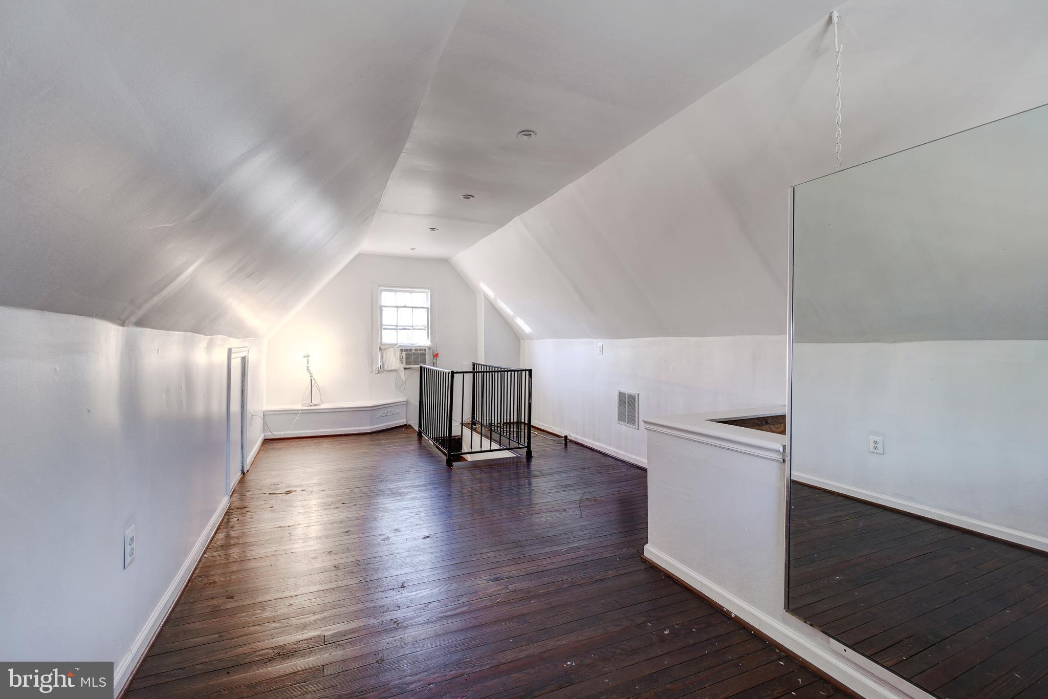 6712 6th Street Northwest Washington, DC 20012 - Photo 28 of 41 a view of an empty room with wooden floor