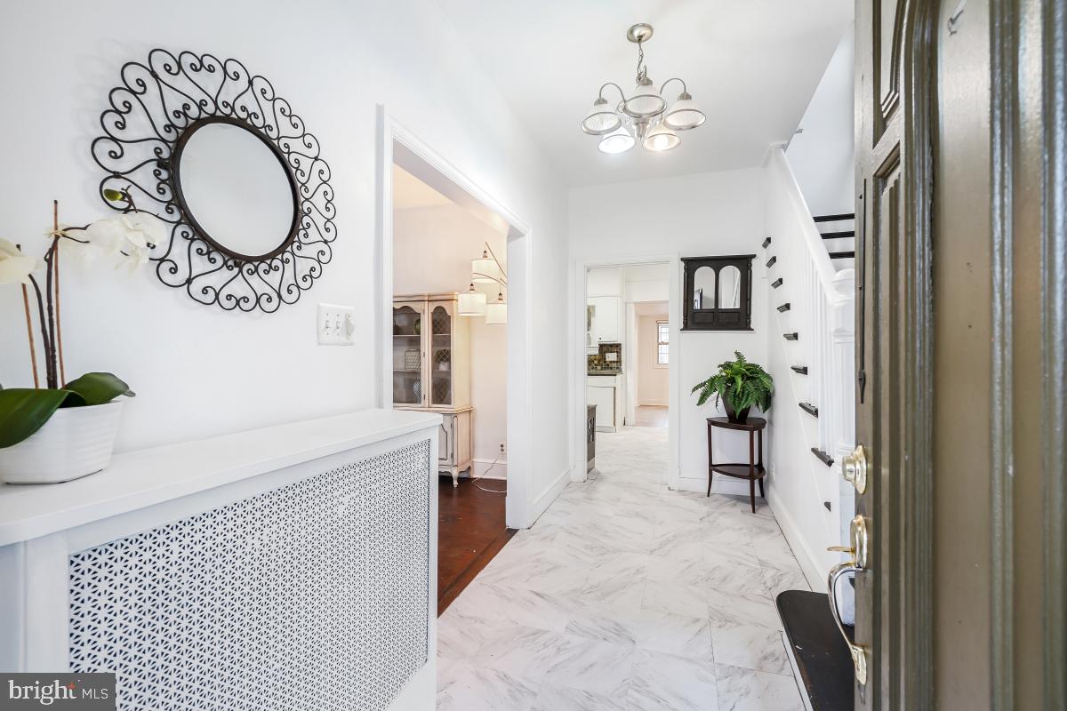 6712 6th Street Northwest Washington, DC 20012 - Photo 6 of 41 a spacious bathroom with a granite countertop sink and a mirror