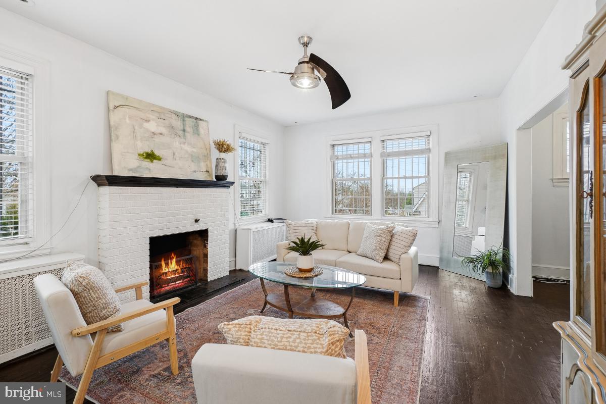 6712 6th Street Northwest Washington, DC 20012 - Photo 8 of 41 a living room with furniture and a fireplace