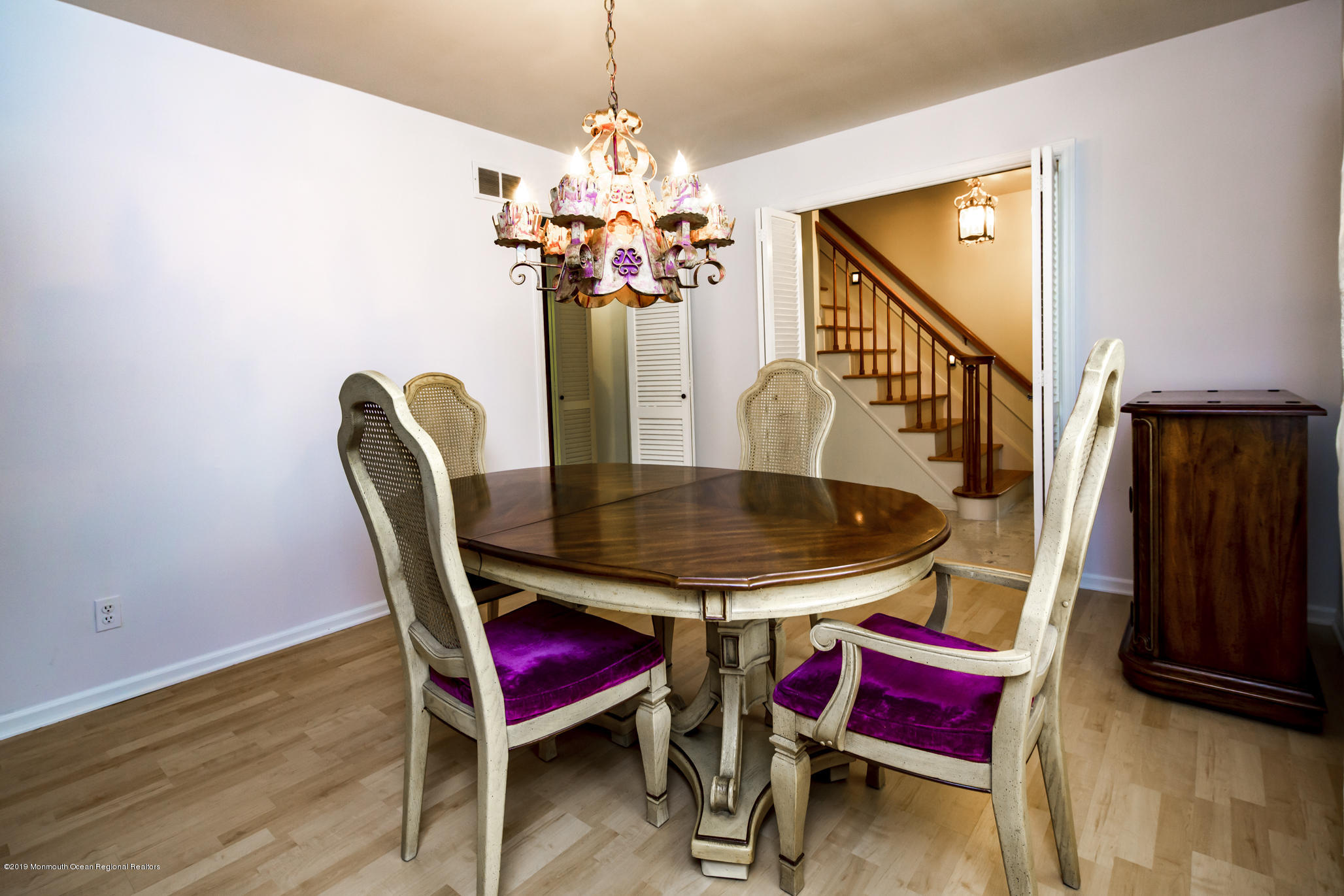 503 Wildwood Road West Allenhurst, NJ 07711 - Photo 11 of 26 a view of a dining room with furniture and wooden floor