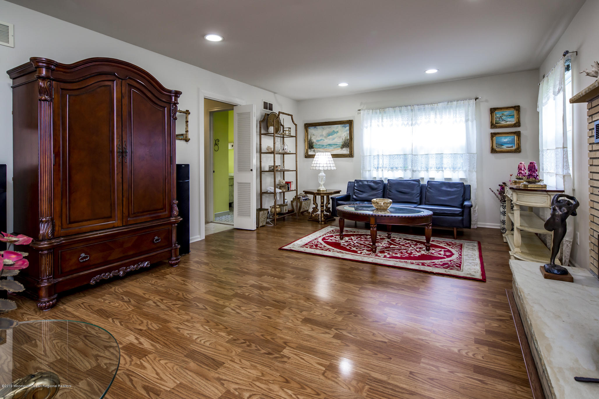 503 Wildwood Road West Allenhurst, NJ 07711 - Photo 13 of 26 a living room with furniture and wooden floor
