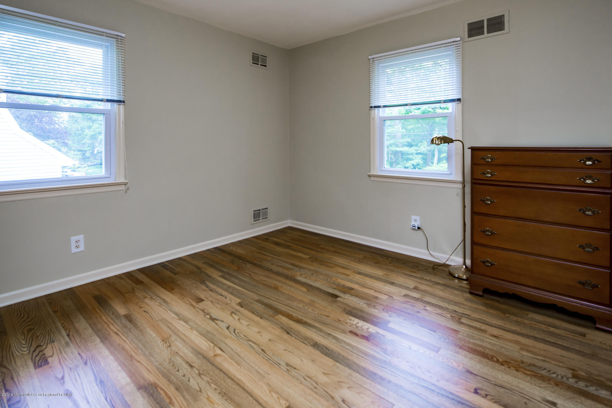 503 Wildwood Road West Allenhurst, NJ 07711 - Photo 18 of 26 a view of a room with wooden floor and window