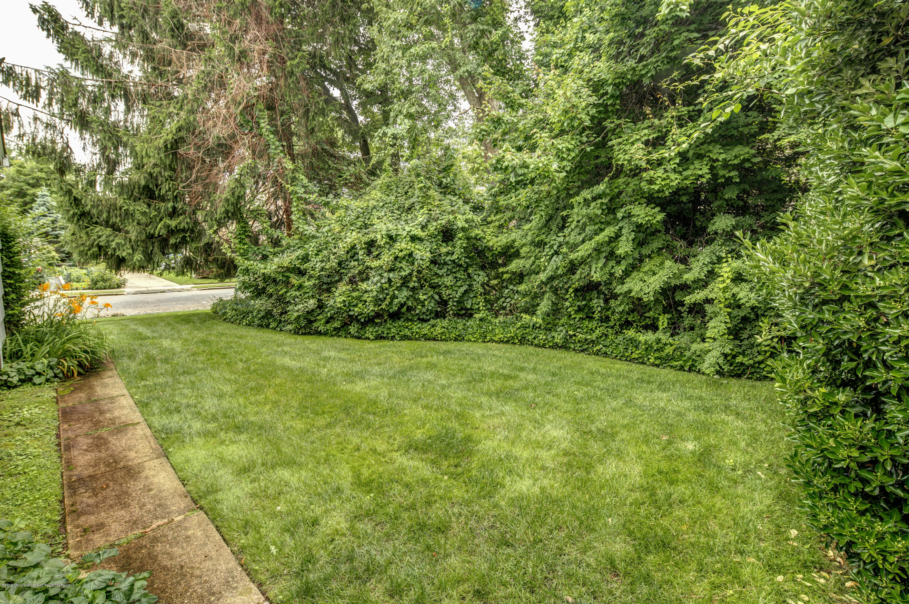 503 Wildwood Road West Allenhurst, NJ 07711 - Photo 25 of 26 a view of yard with green space