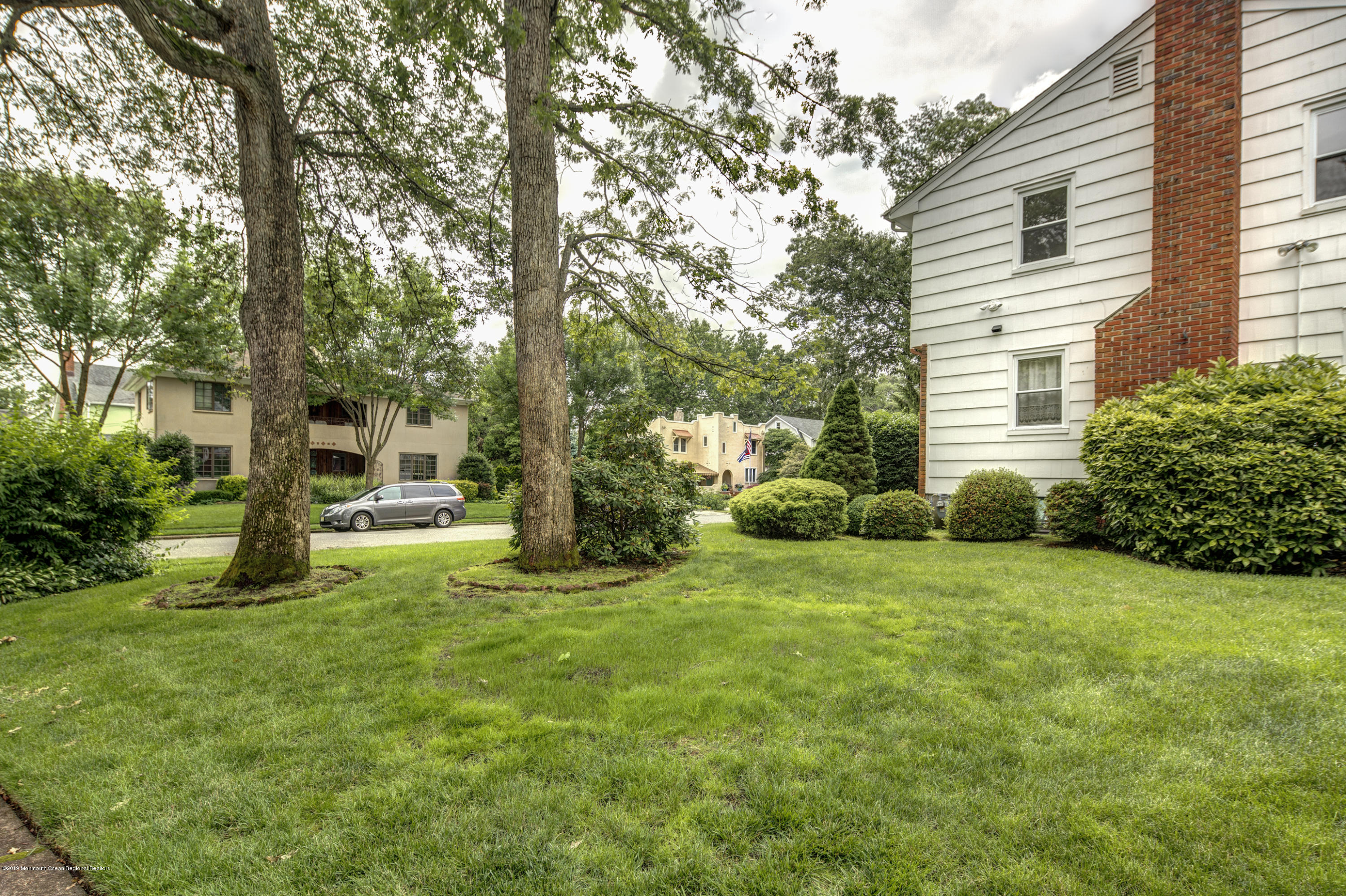 503 Wildwood Road West Allenhurst, NJ 07711 - Photo 26 of 26 a view of a house with a backyard