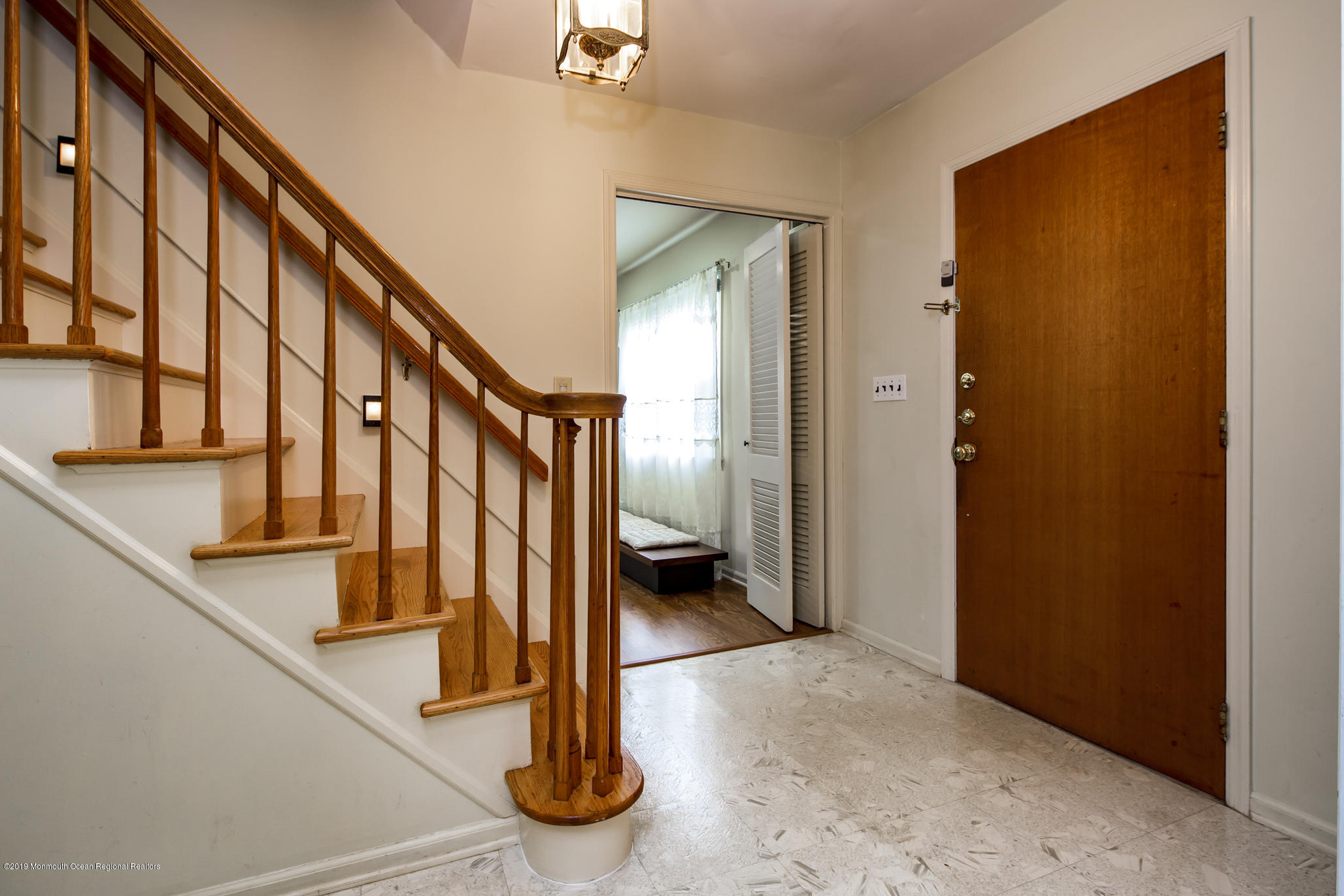 503 Wildwood Road West Allenhurst, NJ 07711 - Photo 5 of 26 a view of an entryway with staircase