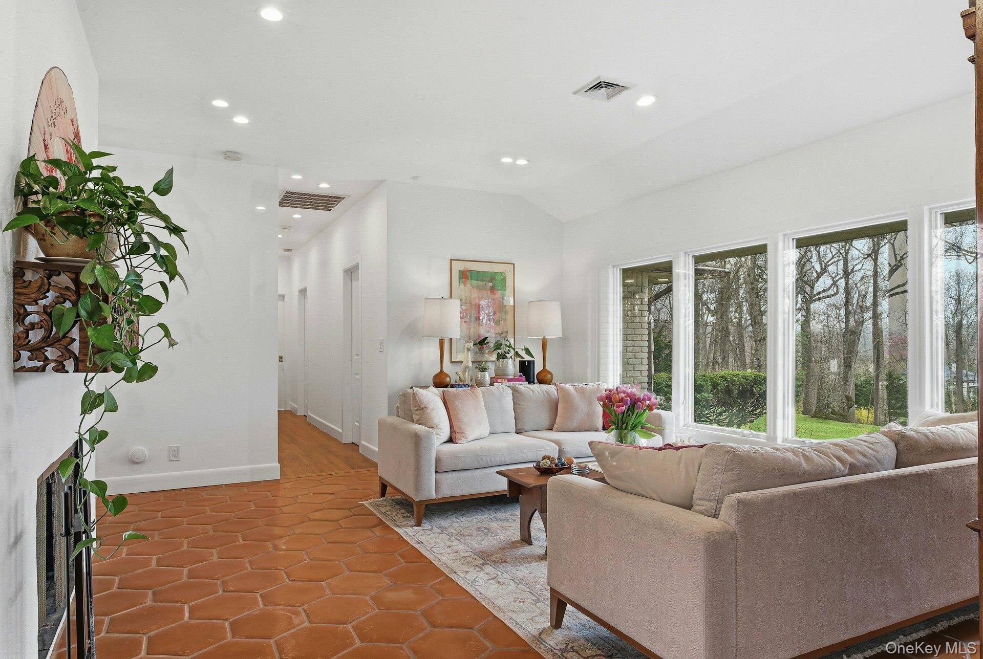 6 Greatmeadow Road Locust Valley, NY 11560 - Photo 19 of 48 Den w/ FP and walls of windows