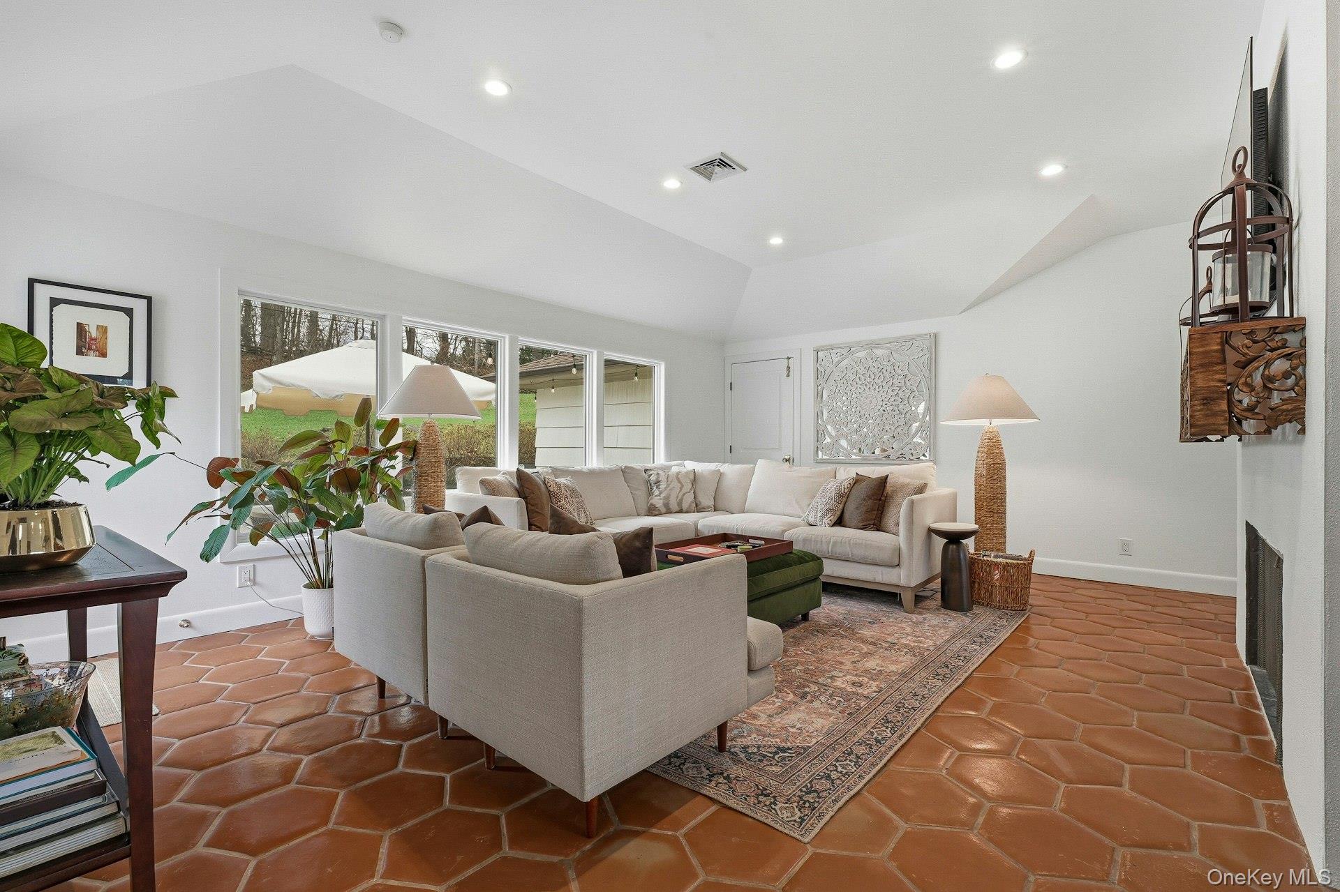 6 Greatmeadow Road Locust Valley, NY 11560 - Photo 20 of 48 Den w/ Windows and door to patio