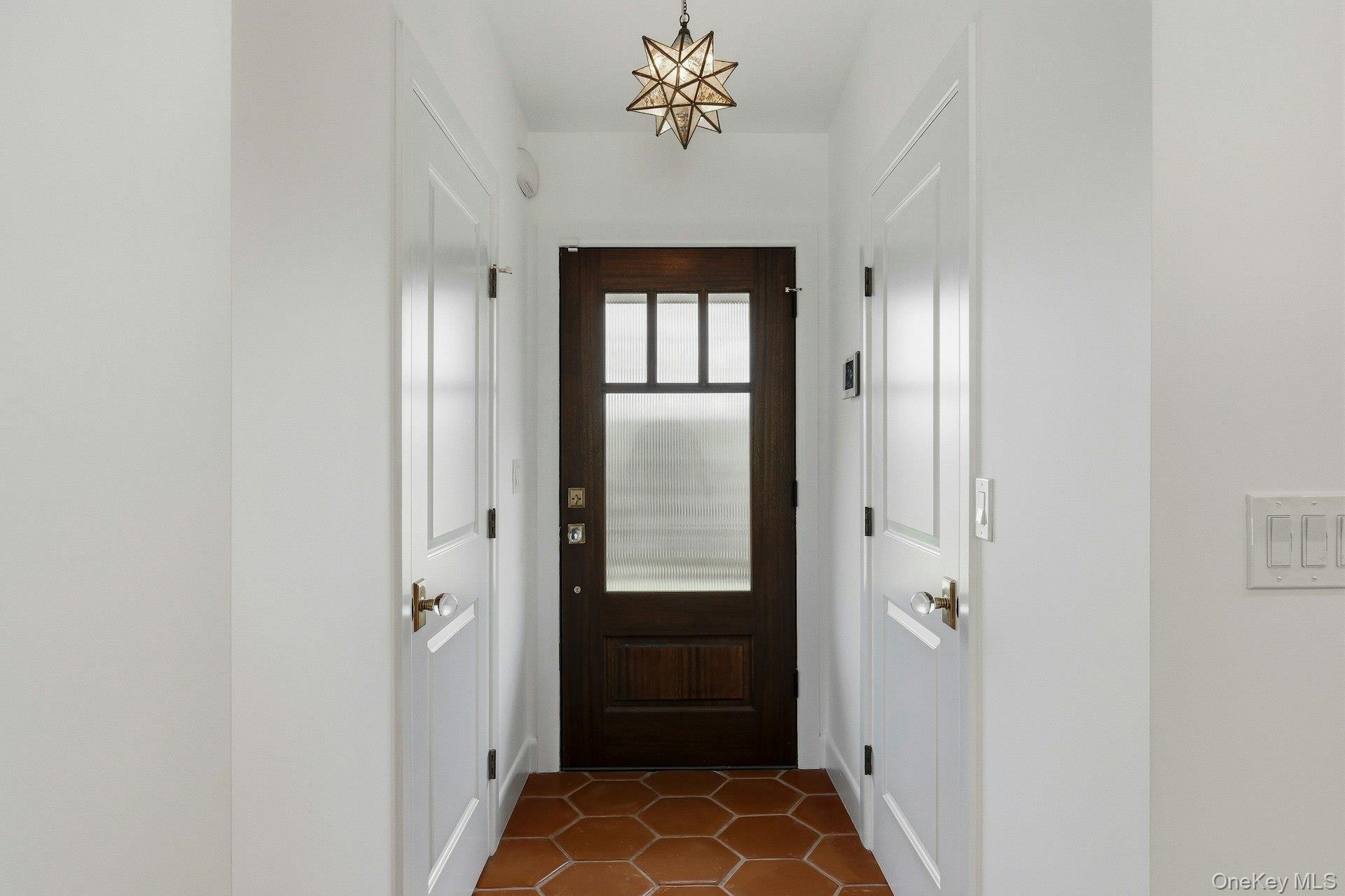 6 Greatmeadow Road Locust Valley, NY 11560 - Photo 4 of 48 Entry Hall w/ Power Room & Closet