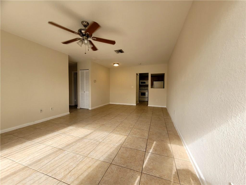 11096 Royal Palm Boulevard, Unit 11096 Coral Springs, FL 33065 - Photo 6 of 20 a view of an empty room