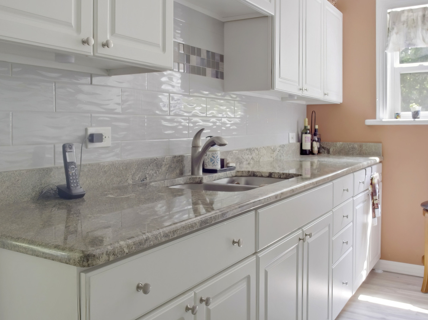 72 Radnor Lane Crete, IL 60417 - Photo 12 of 25 a kitchen with granite countertop a sink stainless steel appliances and cabinets
