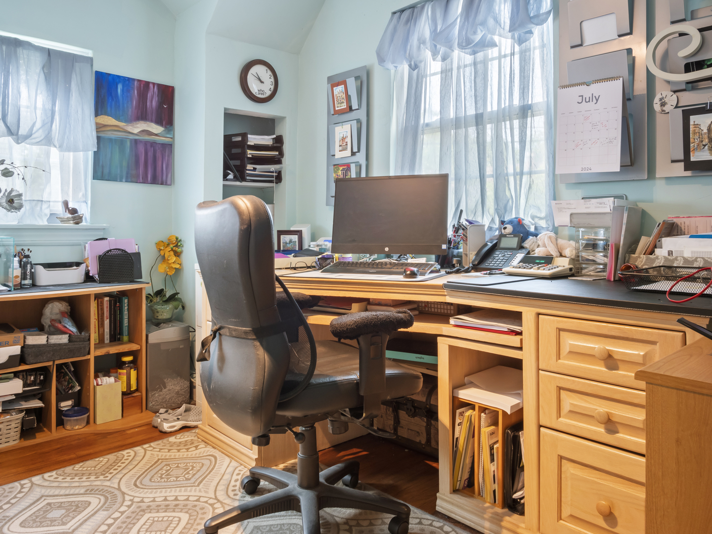 72 Radnor Lane Crete, IL 60417 - Photo 18 of 25 a view of a workspace with furniture and wooden floor