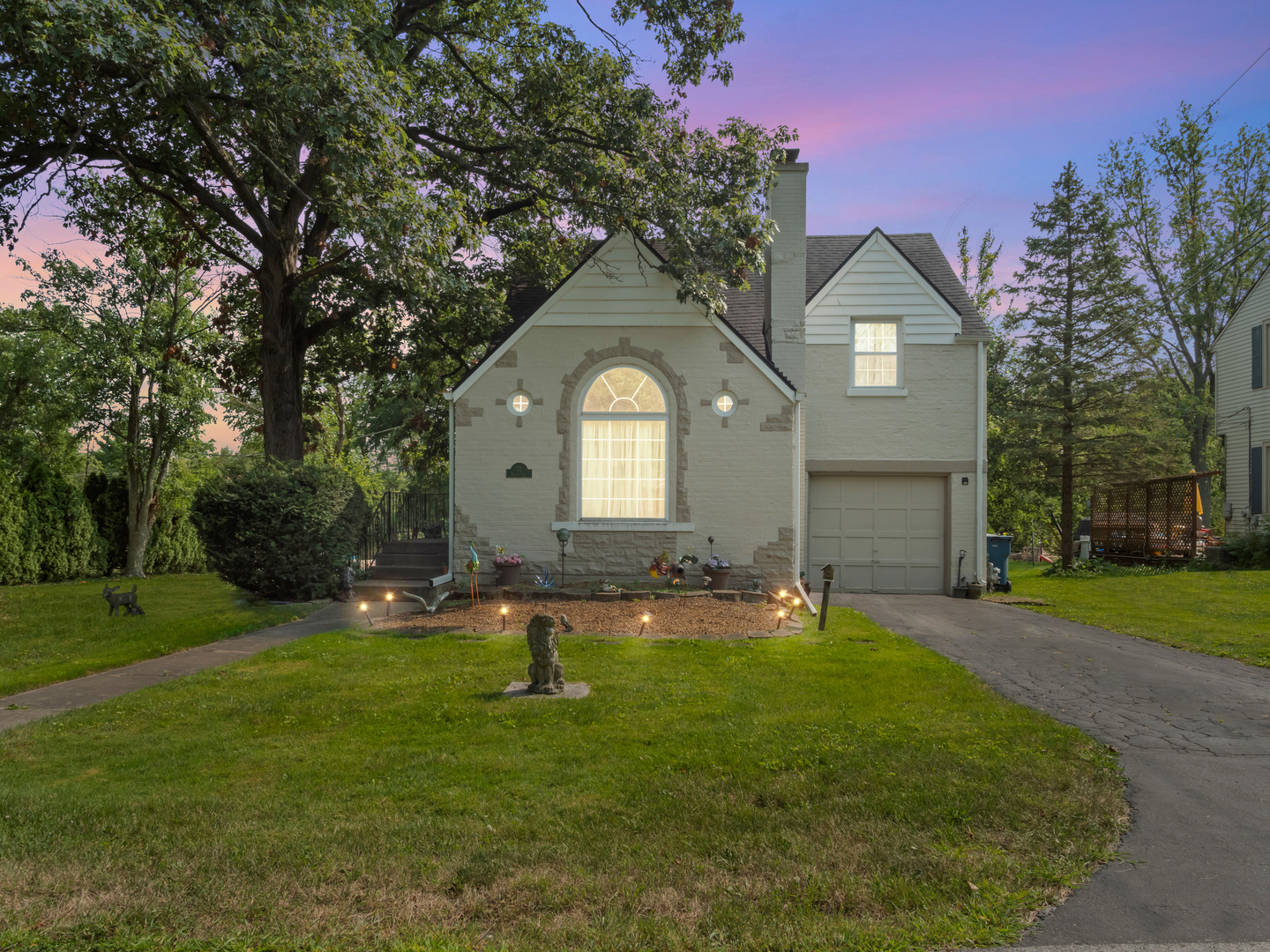 72 Radnor Lane Crete, IL 60417 - Photo 3 of 25 a front view of a house with garden and trees