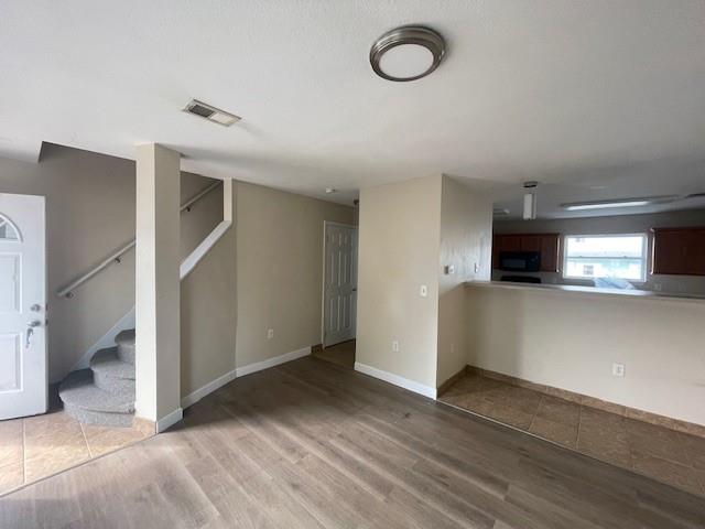 151 Plum Way California, PA 15419 - Photo 3 of 19 a view of a livingroom with an empty space and a window