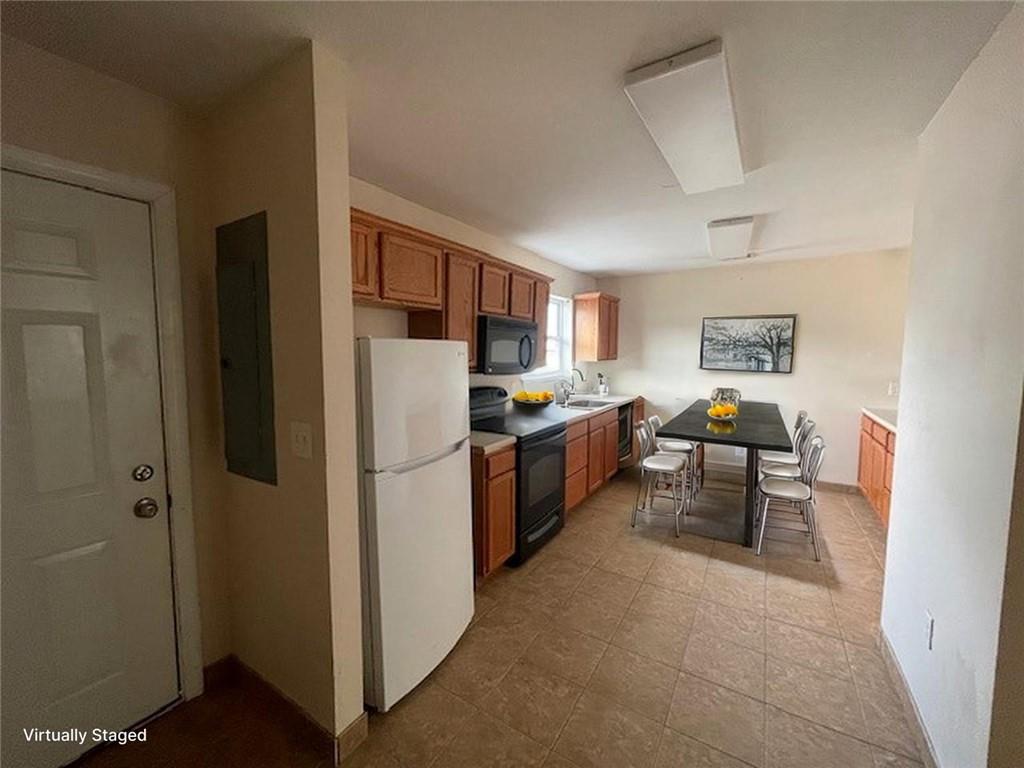 151 Plum Way California, PA 15419 - Photo 4 of 19 a kitchen with stainless steel appliances granite countertop a refrigerator and a stove top oven