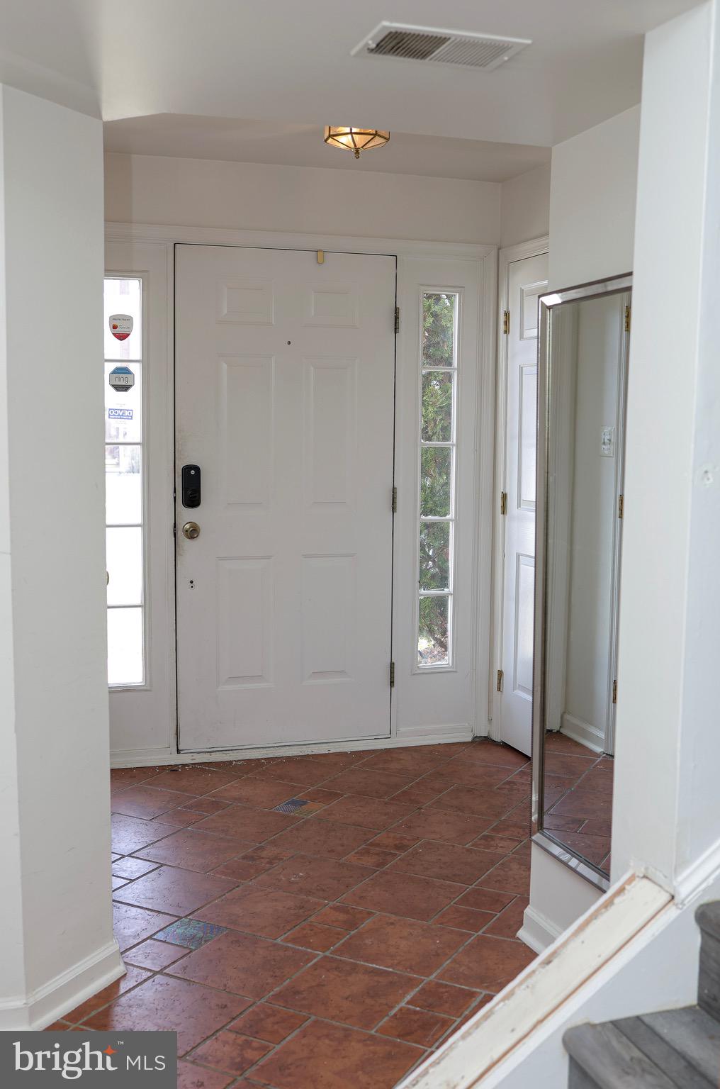 2023 Broadacres Drive Clementon, NJ 08021 - Photo 22 of 22 an empty room with wooden floor and windows
